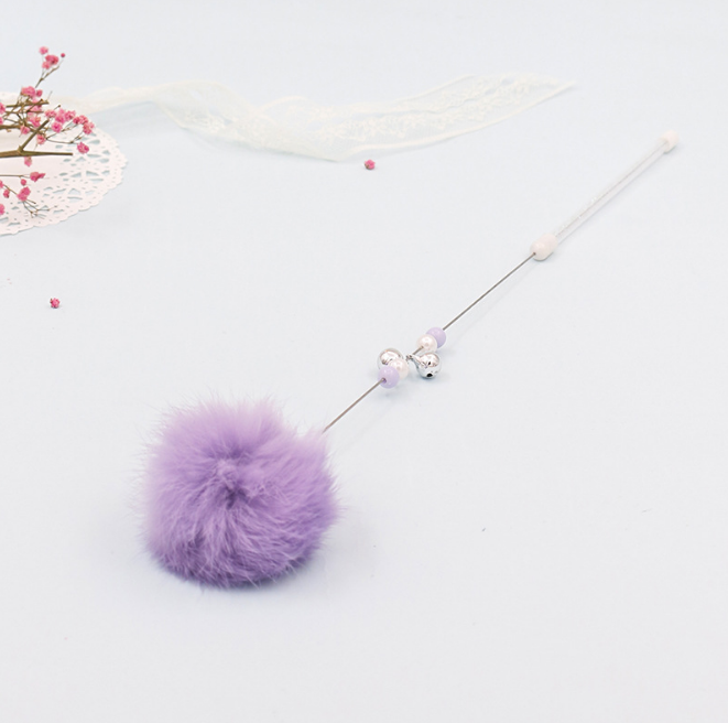 Bunter Pom Pom Katzenangel mit Glockenspielzeug