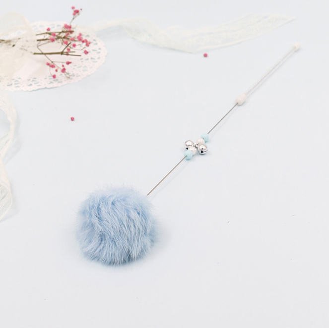 Bunter Pom Pom Katzenangel mit Glockenspielzeug