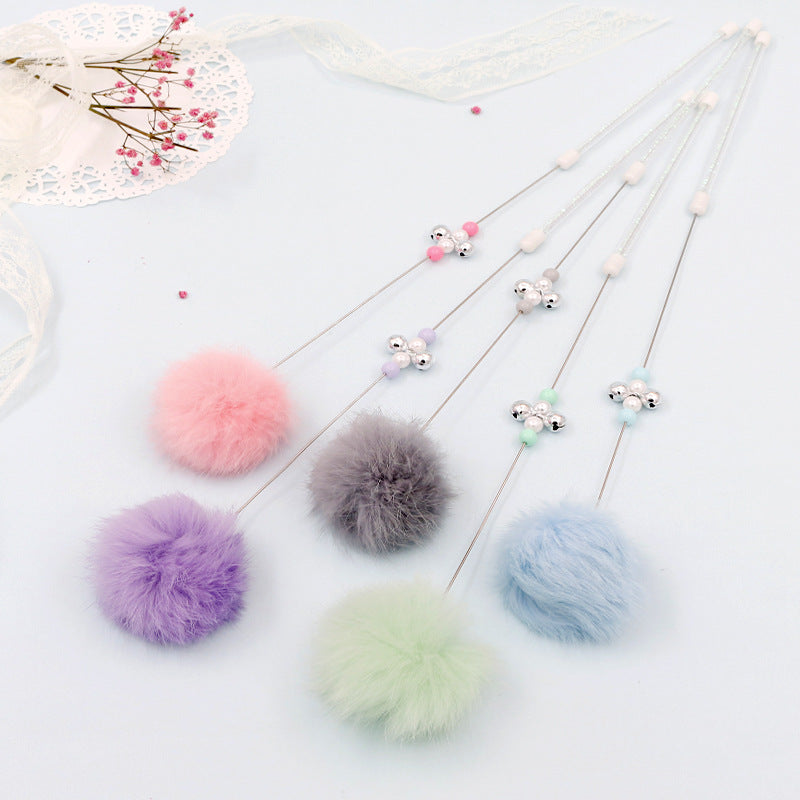 Bunter Pom Pom Katzenangel mit Glockenspielzeug