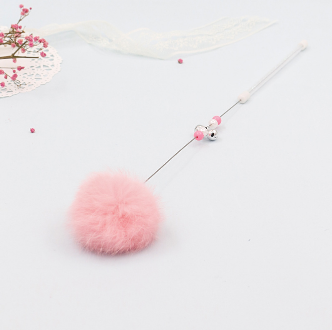 Bunter Pom Pom Katzenangel mit Glockenspielzeug
